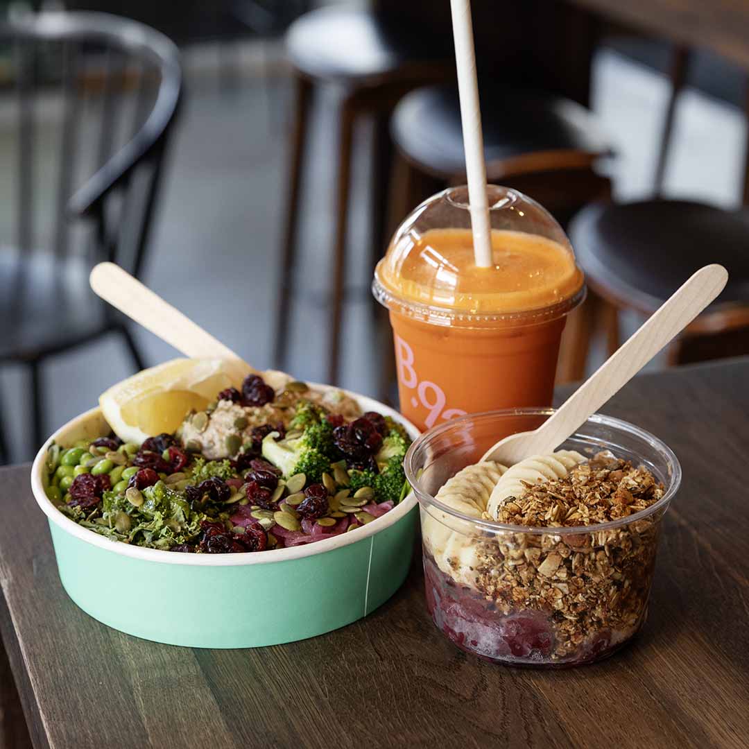 Delicious salad, orange juice, and acai bowl from Joe & The Juice in Frederiksberg.